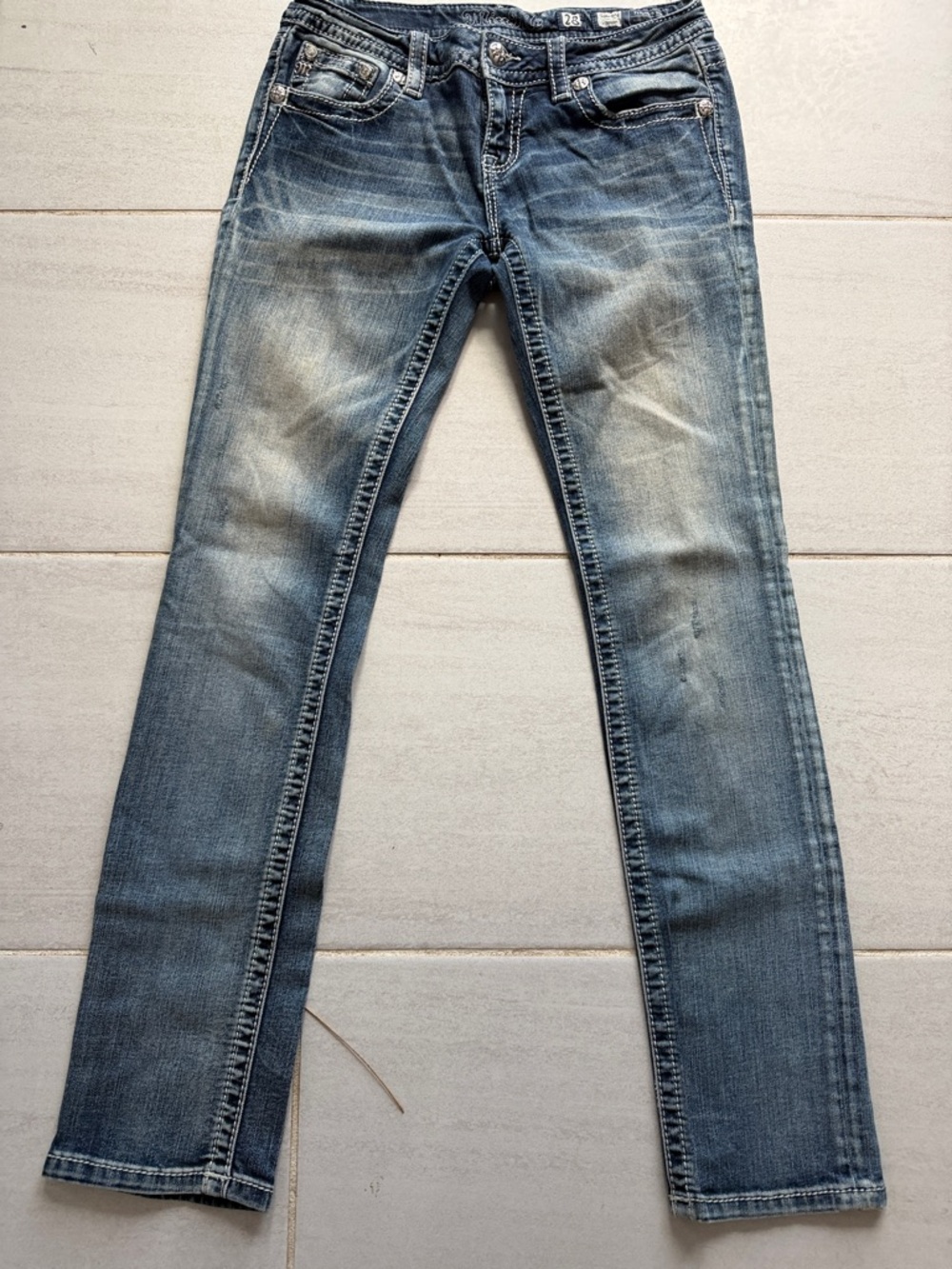 Miss Me straight leg faded blue jeans